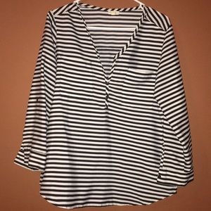 Black and white striped blouse.